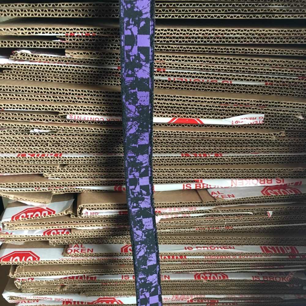 Purple and black checkered belt